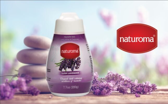 Naturoma Lush Lavender fabric softener bottle with lavender sprigs and a large Naturoma logo in the background on the right.